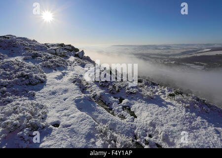 January, winter snow and mist over Curbar valley; Derbyshire County; Peak District National Park; England; UK Stock Photo