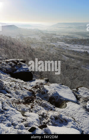 January, winter snow and mist over Curbar valley; Derbyshire County; Peak District National Park; England; UK Stock Photo