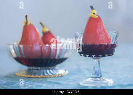 Pears cooked in red wine Stock Photo