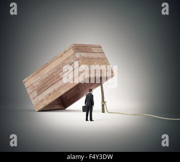 Businessman stranding next to a trap