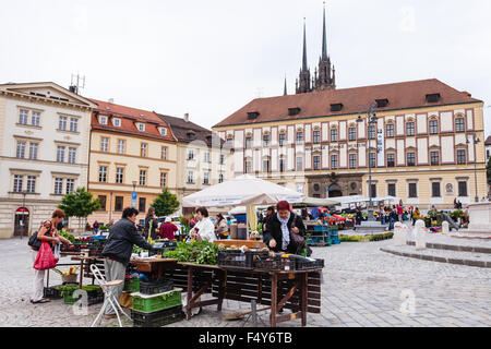 BRNO, CZECH - SEPTEMBER 25, 2015: People buy vegetables at Cabbage Market (Zelny trh) in old town Brno. Vegetable Market is loca Stock Photo