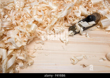 Hand jointer and shavings on pine boards Stock Photo