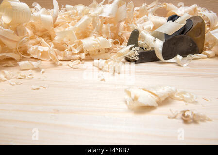 Hand jointer and shavings on pine boards Stock Photo