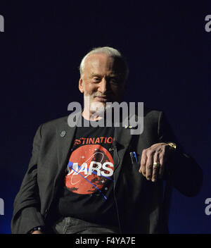 Garden City, New York, USA. 23rd Oct, 2015. Former NASA astronaut Edwin BUZZ ALDRIN smiles as he gestures with his left hand during conversation about his early years, experiences in space, and his new Children's Middle Grade book Welcome to Mars: Making a Home on the Red Planet. After the talk at the jetBlue Sky Theater Planetarium at Long Island's Cradle of Aviation Museum, Aldrin signed copies of his new book. Aldrin is wearing his Destination MARS shirt. On the 1969 Apollo 11 mission, Buzz Aldrin was the second person ever to walk on the Moon, and his first trip to space was the Stock Photo