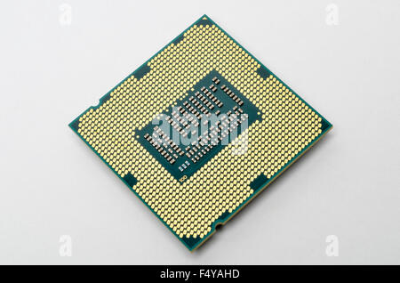 Intel i5 3570K 3.4 GHz Quad Core LGA1155 CPU processor chip on a white background. Stock Photo