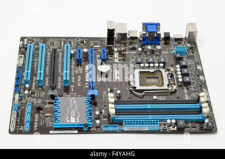 ASUS motherboard (P8Z77-V LX) on a white background. Stock Photo