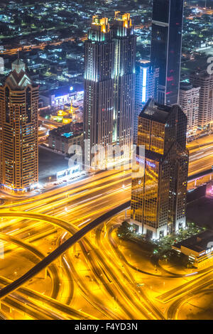 DUBAI, UAE - NOVEMBER 13: Aerial view of Downtown Dubai with man made lake and skyscrapers from the tallest building in the worl Stock Photo