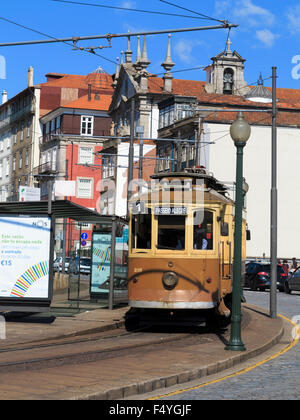 Historic tram on line 1 (one) Passeio Alegre�Infante coming round a bend on Rua Nova da Alf�ndega Porto (Oporto) Portugal Stock Photo