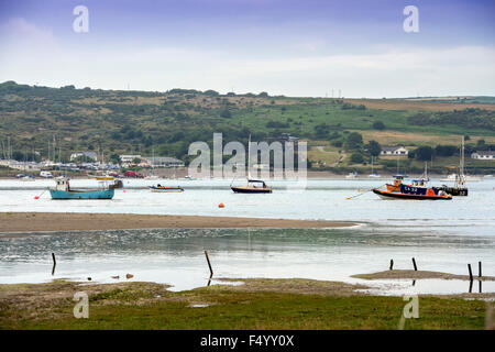 Fishing boats moored on the River Teifi estuary near St Dogmaels, Pembrokeshire, Wales UK Stock Photo