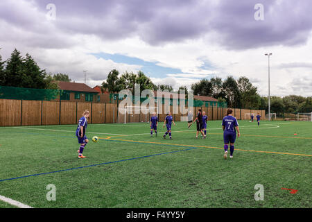 Female football team training session at the FC United football pitch in Manchester, UK. Stock Photo