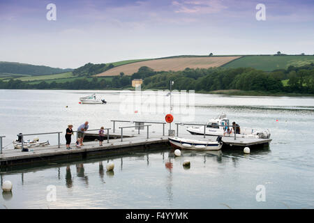 A family crabbing off a jetty at St Dogmaels, Pembrokeshire, Wales UK Stock Photo