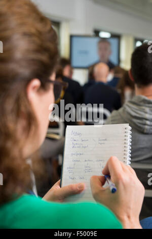 The Entrepreneurial-spark small business training day at Trinity Quay, Bristol - a delegate makes notes on pitching during a vis Stock Photo