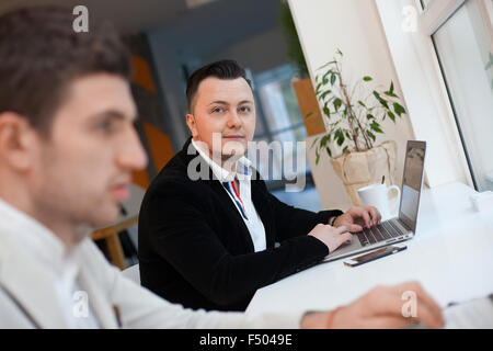 Two men working in startup center Stock Photo