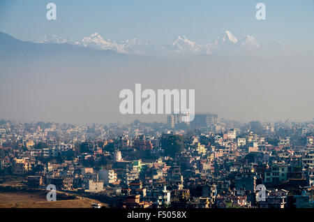 Kathmandu Valley in smog, snowy mountains in distance Stock Photo