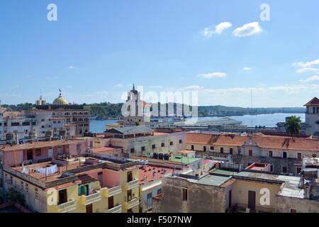 Pastel colors of Havana cityscape - looking across the rooftops and out to sea, Cuba Stock Photo