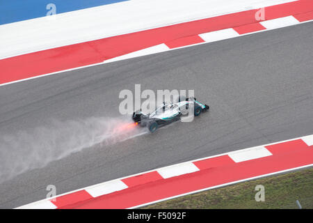 Austin, Texas USA October 25, 2015: Formula 1  driver              races in qualifying at a soaked Circuit of the Americas track in Sunday. Race officials are insistent on keeping Sunday's United States Grand Prix on schedule despite continued bad weather. Credit:  Bob Daemmrich/Alamy Live News Stock Photo