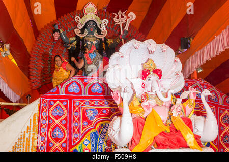 Statue of the God Ganesha in a tent at the Sangam, the confluence of the rivers Ganges, Yamuna and Saraswati, at Kumbha Mela Stock Photo