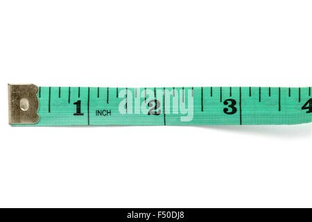 Green tape measure on white background Stock Photo