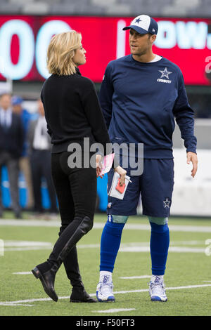 A FOX Sports employee holds a sound dish on the sideline during an NFL football  game between the Green Bay Packers and Dallas Cowboys on Sunday, Oct. 8,  2017, in Arlington, Texas. (