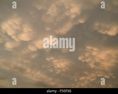 Ominous mammatus clouds at sunset Stock Photo