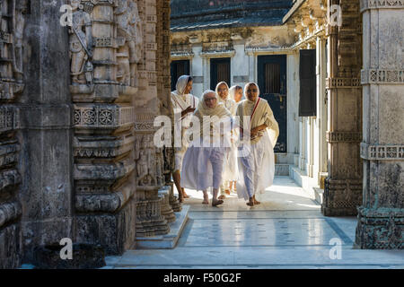 A group of Jain nuns is visiting a temple at Shatrunjaya hill, one of the major pilgrim sites for Jains, at the day of the yatra Stock Photo