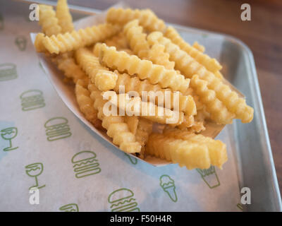 Crinkle cut French fries at Shake Shack Stock Photo