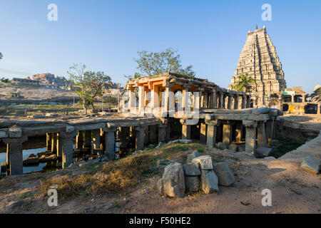 Temples, used for living by local people, are getting restored as a part of the ruins of the former Vijayanagara Empire, which w Stock Photo