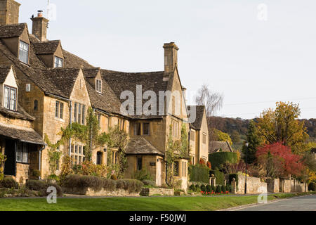 Cotswold stone houses in the Autumn sunshine. Stock Photo