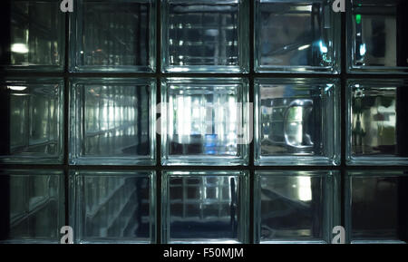 Transparent wall made of glass blocks, background photo texture Stock Photo
