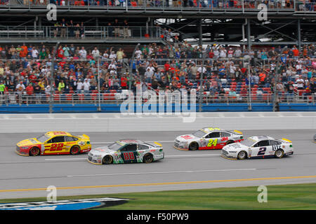 Joey Logano (22), Dale Earnhardt Jr. (88) and Travis Kvapil (93) during ...