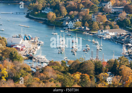 A birds-eye-view of Camden Harbor and surrounding fall foliage from Mt. Battie in Camden, Maine. Stock Photo