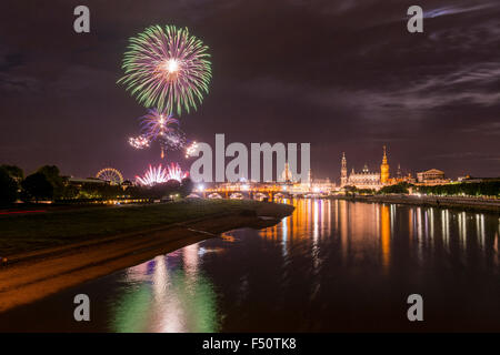 Fireworks illuminating the old part of the town, seen from the Marien Bridge Stock Photo