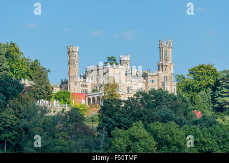 The castle Eckberg is overlooking the valley Elbe, surrounded by trees Stock Photo