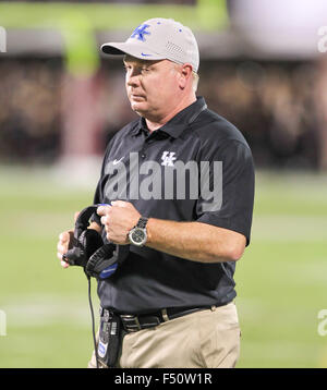 Starkville, MS, USA. 24th Oct, 2015. Kentucky Wildcats head coach Mark Stoops thinks about calling timeout during the NCAA Football game between the Mississippi State Bulldogs and the Kentucky Wildcats at Davis Wade Stadium in Starkville, MS. Chuck Lick/CSM/Alamy Live News Stock Photo