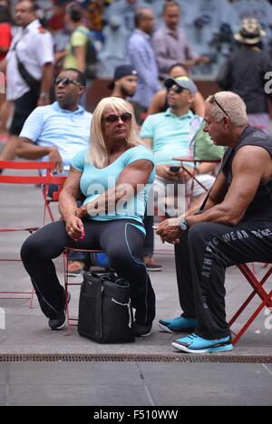 Bodybuilder Carmen Brady sitting in Times Square  Featuring: Carmen Brady Where: New York City, New York, United States When: 24 Aug 2015 Stock Photo