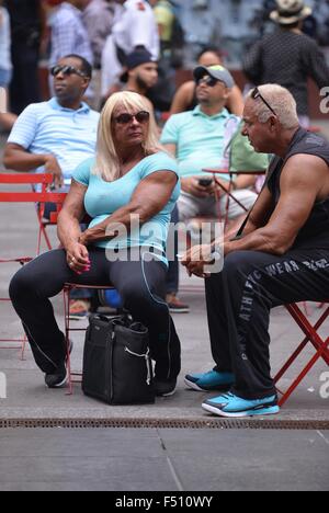 Bodybuilder Carmen Brady sitting in Times Square  Featuring: Carmen Brady Where: New York City, New York, United States When: 24 Aug 2015 Stock Photo