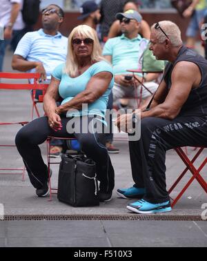 Bodybuilder Carmen Brady sitting in Times Square  Featuring: Carmen Brady Where: New York City, New York, United States When: 24 Aug 2015 Stock Photo