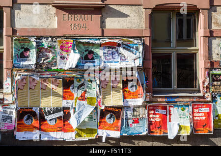 Even the old and historic buildings in the township Neustadt get used as display for posters Stock Photo