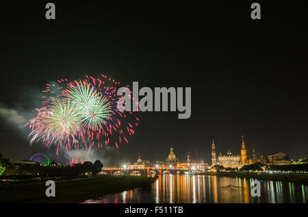 Fireworks illuminating the old part of the town, seen from the bridge Marien Bridge Stock Photo