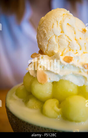 Ice cream in a half of melon balls. Bing Su Stock Photo