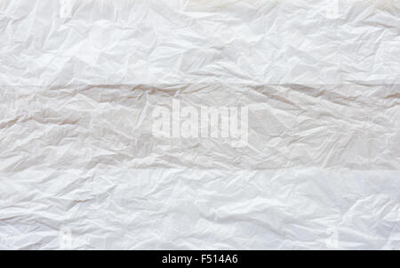 Crumpled white plastic bag for use in the house. Stock Photo