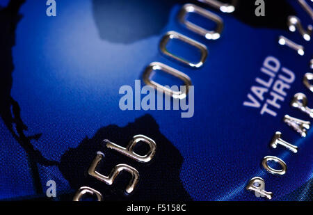 Bank credit card macro, fake numbers. Dark tones Stock Photo