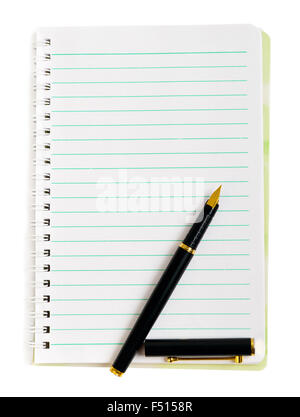 Ink pen on lined notepad paper isolated on white Stock Photo