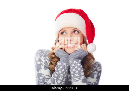 Young smiling female in Santa cap Stock Photo