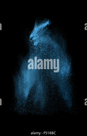 Abstract design of blue powder cloud against dark background Stock Photo