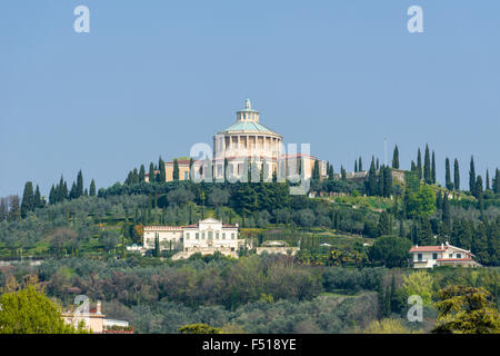 The church La Madonna di Lourdes is located on a hill above the city Stock Photo