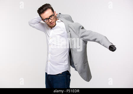 Portrait of a young businessman dressing jacket isolated on a white background Stock Photo