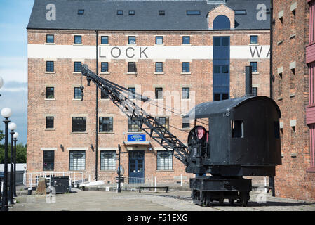 A crane on a train track at Gloucester docks Stock Photo