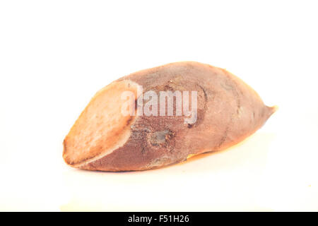 Organic sweet potato, isolated on white background Stock Photo