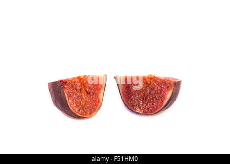 Two isolated, purple figs, on white background Stock Photo